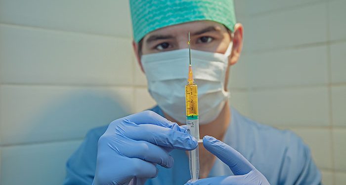 Pfizer Begins Manufacturing of COVID-19 Vaccines in Anticipation of FDA Approval