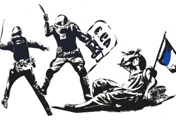 French Policemen Suspended, Caught On Video Beating a Black Man in His Studio